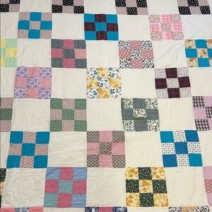 Vintage handmade scrappy 9 patch quilt. 69”x75” Feedsack used in 9 patches.
